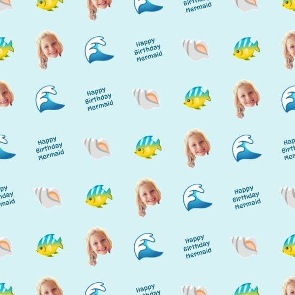 Pale aqua wrapping paper with mermaids, seashells, tropical fish and waves, with a name in the shells