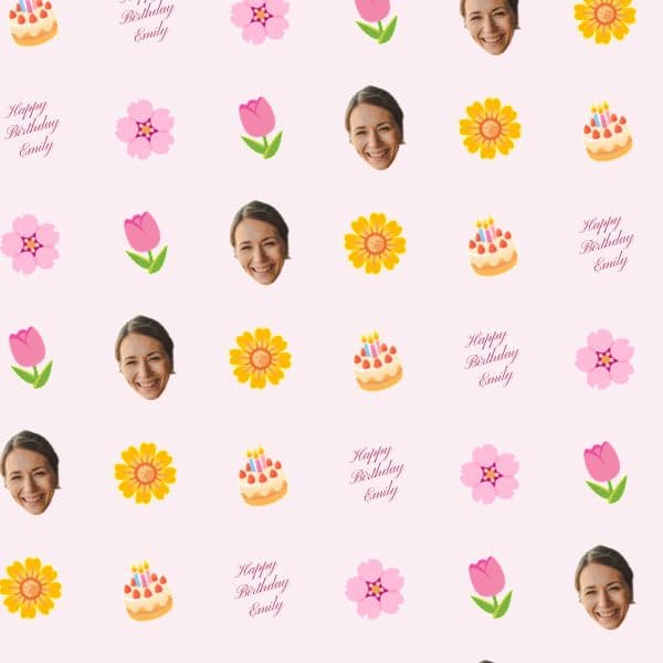 Blush pink wrapping paper with birth-flower illustrations and a name in elegant script with a birthday message