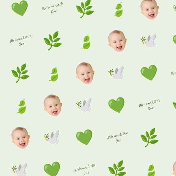 Sage-green botanical wrapping paper with delicate leaves, a smiling baby and space for a name and quote