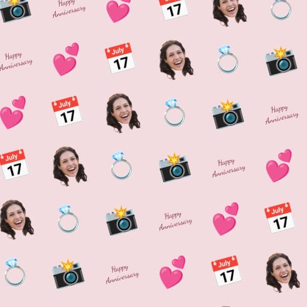 Repeating pattern of blush hearts, calendar pages and gold photo frames on romantic anniversary wrapping paper