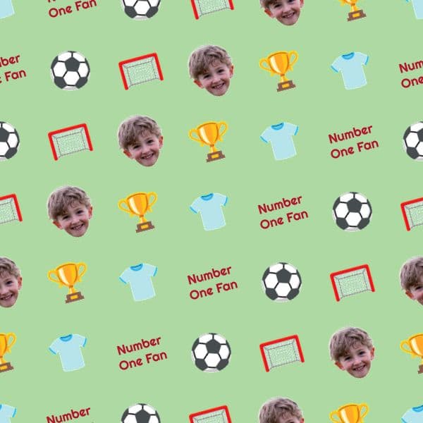 Pitch-green wrapping paper with football emojis, a smiling young fan photo and repeating bold name text