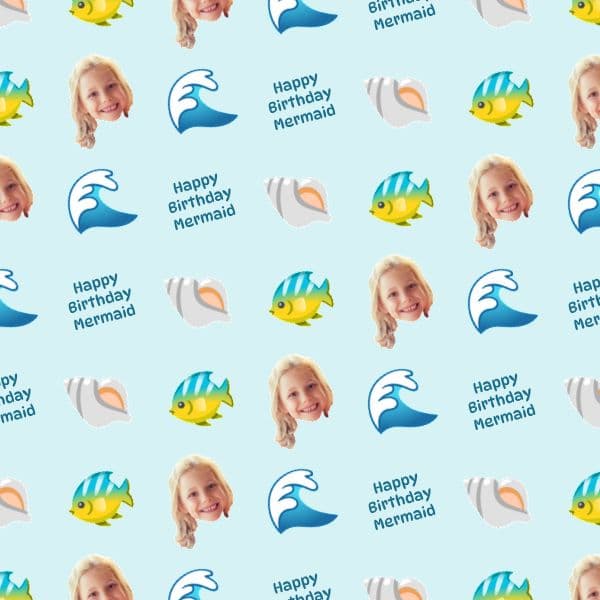 Pale aqua wrapping paper with mermaids, seashells, tropical fish and waves, with a name in the shells