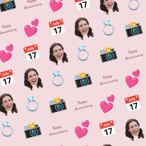 Repeating pattern of blush hearts, calendar pages and gold photo frames on romantic anniversary wrapping paper