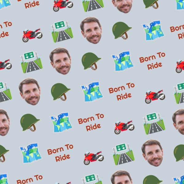 Slate-grey wrapping paper with motorbike helmets, winding route maps and open-road motifs in bold colours