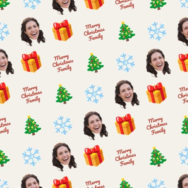 Christmas wrapping paper with colourful baubles, snowflakes and a repeating smiling family face on cream background