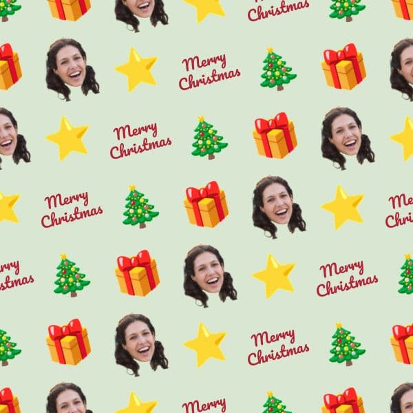 Christmas wrapping paper with a family photo surrounded by Christmas trees and wrapped presents in red and green