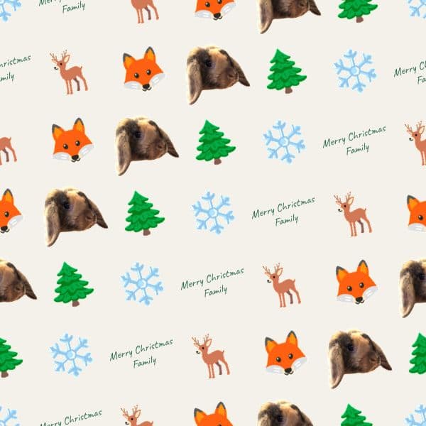 White Christmas wrapping paper with festive woodland animals and family names scattered across it